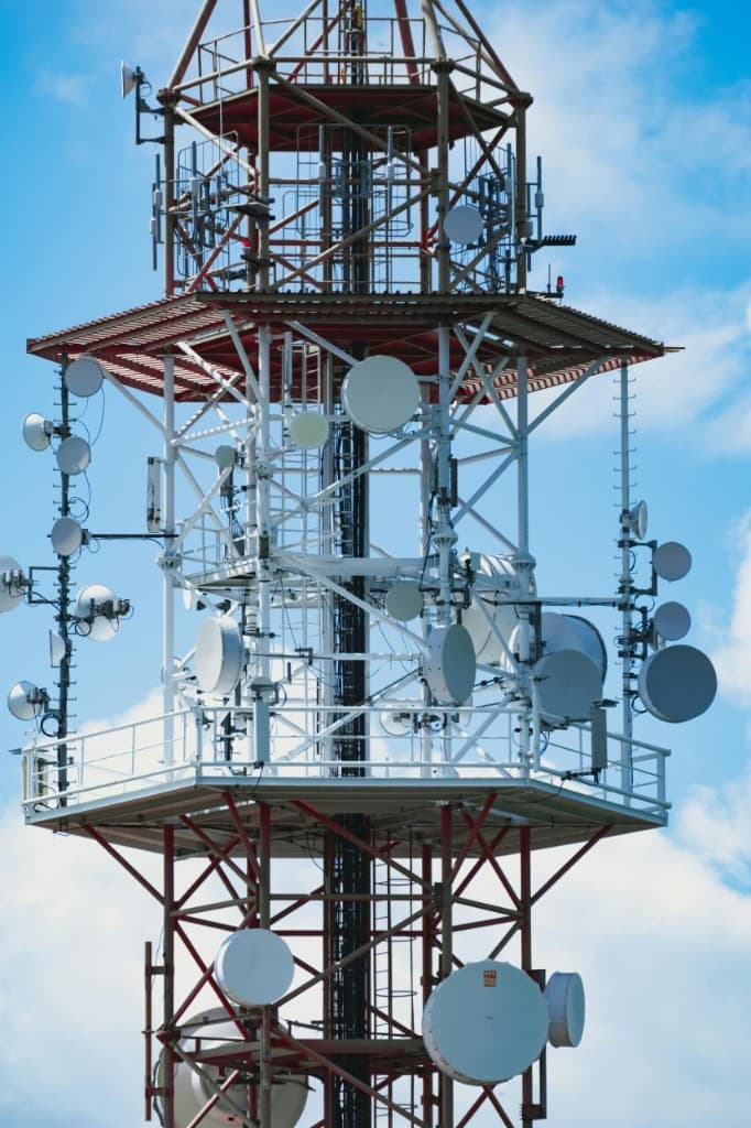 Network tower with microwave dishes